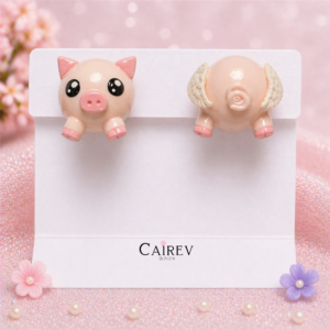 Aretes de cerdito con alitas kawaii color rosa hechos a mano