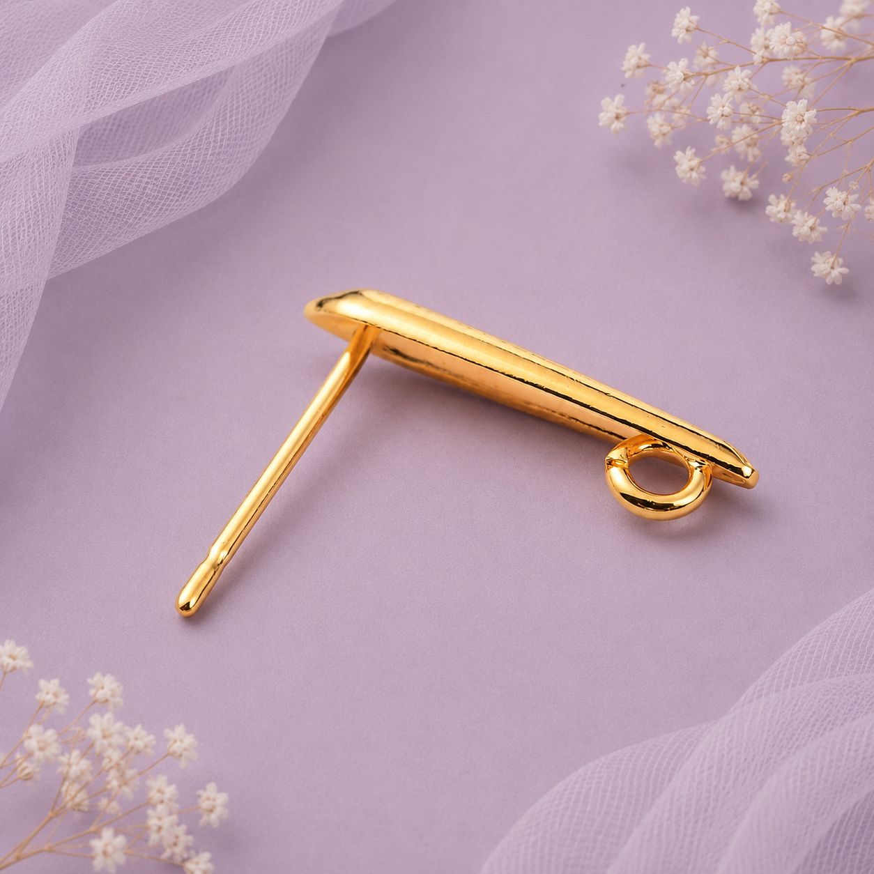 Detalle de base para arete tipo lágrima de latón chapado en oro 18K con bucle